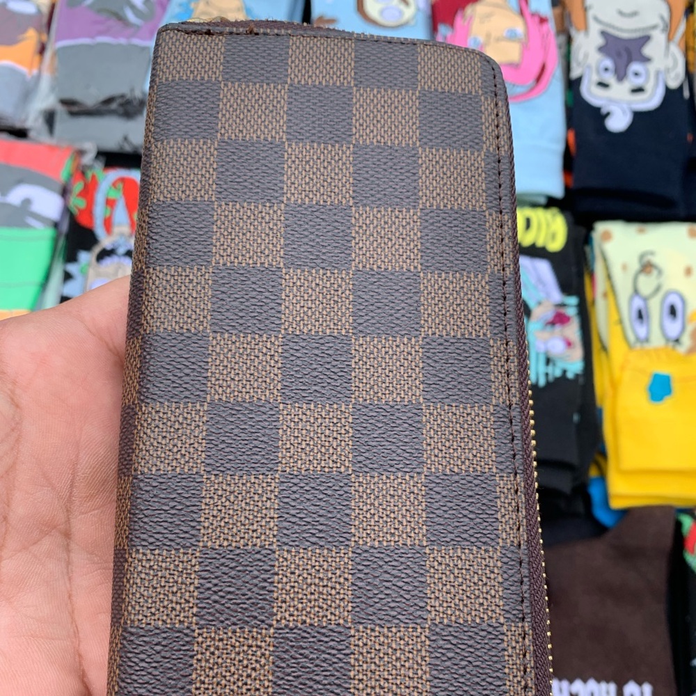 Louis Vuitton wrist bag. Like new.